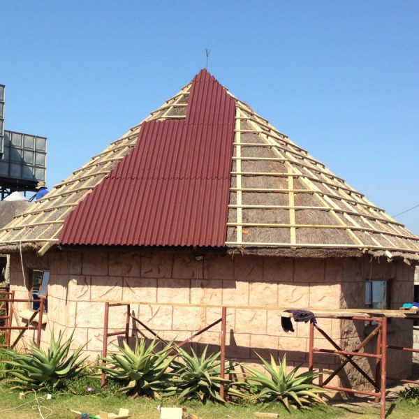 Convert thatch roof to tiles